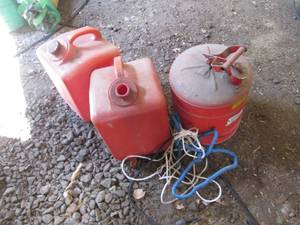 3 gas cans 2 plastic 1 metal...