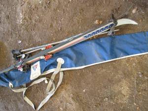 K2 skis with poles and American Air...