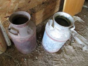 2 vintage milk cans...