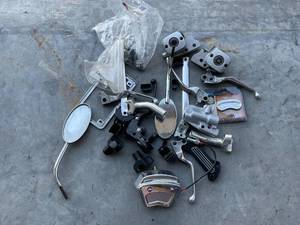 lot 51 image: Harley Davidson Mirrors, Levers, and More