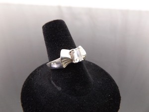 lot 73 image: .925 Sterling Silver Emerald Cut Zirconia Bow Ring Size 8