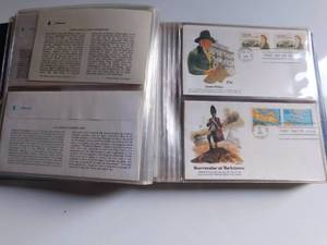 Book of 1st day issue stamps and matching envelopes