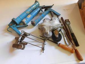 Florence handy light, extension cords, caulk guns, saw and more