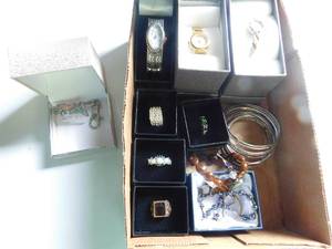 Box of rings, bracelets, and watches