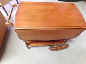 Wood serving cart on wheels