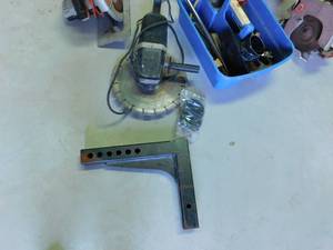 New window, 2 skillsaws, hydraulic hand jack, angle saw with diamond blade & more