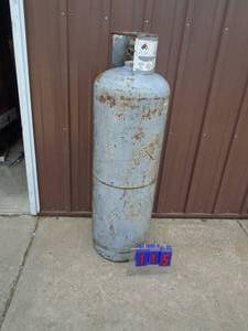100 lb propane tank. As shown.