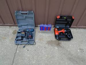 Black & Decker cordless drill with 2 batteries & charger. Tested & works. As shown. Ryobi drill & charger batteries appear dead