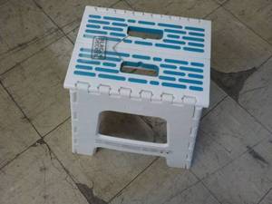 lot 125 image: Black and Decker Collapsible Stool...