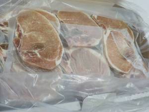 lot 222 image: 10 lb. Box Frozen Bone In Porkchops...