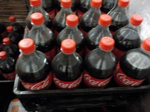 lot 318 image: Case of 12 - 1 liter Bottles Coca C...