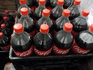 lot 319 image: Case of 12 - 1 liter Bottles Coca C...