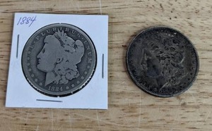 1884 &amp 1899 Morgan Silver Dollar Coins X