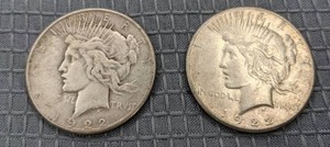 Pair of 1922 Peace Silver Dollar Coins X