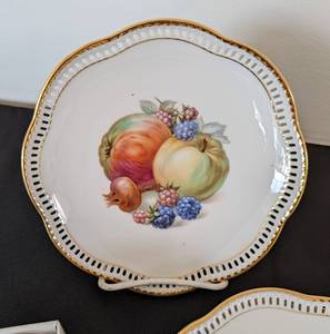 lot 45 image: Painted German Fruit Plates and Porcelain Napkin Rings