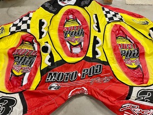 lot 103 image: Moto-Pod Racing 3 Person Inflatable Water Device
