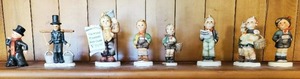 lot 69 image: Collection Of 6 Hummel And 1 Schmid Figurines