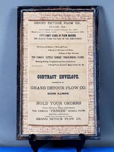 lot 45 image: Vintage Framed Grand Detour Plow Co. Advertisement Piece