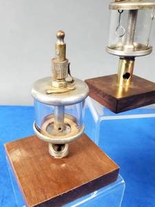 lot 159 image: (4) Vintage Hit-Miss Engine Oil Sight Glasses