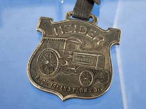lot 330 image: Vintage Heider Tractor Watch Fob