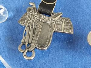 lot 332 image: (2) Western Saddle Watch Fobs