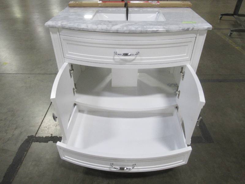 lot 126 image: Dacosti 36 in. W x 22 in. D Vanity in White with Marble Vanity Top in White with White Sink - Cracked Top.