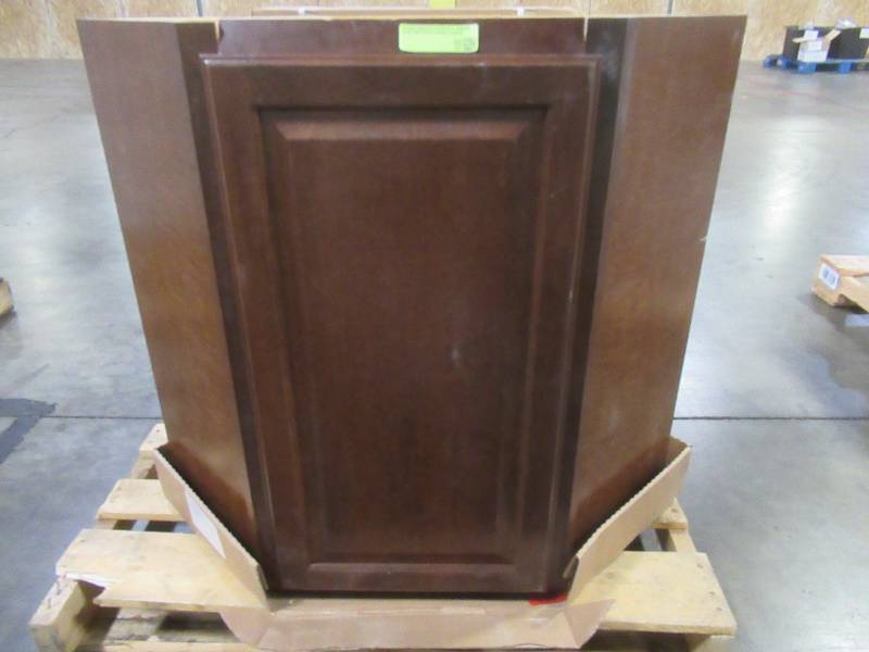 lot 102 image: Hampton Assembled 24x30x12 in. Diagonal Corner Wall Kitchen Cabinet in Cognac - Crack in top.