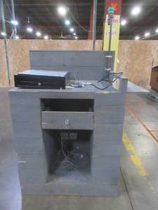 lot 250 image: RETAIL CASH REGISTER CHECKOUT ISLAND, Approximately 36 x 25 x 52 12 Tall, 39 12 Work Top. With cash drawer and power hook up - Used in retail store.