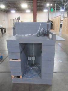 lot 253 image: RETAIL CASH REGISTER CHECKOUT ISLAND, Approximately 36 x 25 x 52 12 Tall, 39 12 Work Top. Missing cash drawer and storage drawer. Has power hookup. - Used in retail store.