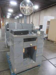lot 255 image: RETAIL CASH REGISTER CHECKOUT ISLAND, Approximately 36 x 25 x 52 12 Tall, 39 12 Work Top. With cash drawer, mirror and power hook up - Used in retail store.