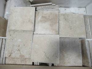 lot 262 image: Pallet of Travertine Natural Stone Tile.  Approximate Dimensions 8 x 8. Count Unknown Guesstimate is around 360 Tiles.