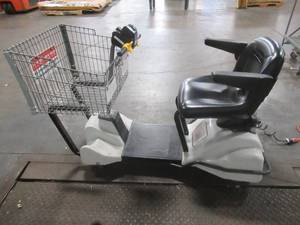 lot 264 image: MARTCART - WORKS AND RUNS WELL. FRONT WHEEL NEEDS TO BE REATACHED AND WIRE HOOKED BACK UP - NEEDS SOME WORK.