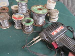 lot 46 image: BOX OF SOLDERING WIRE & PASTE WITH SOLDERING GUN