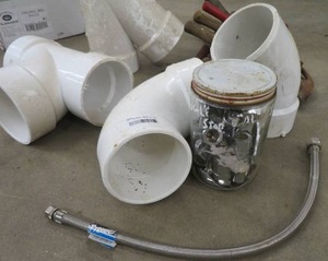 lot 77 image: BOX OF MISC. PLUMBING