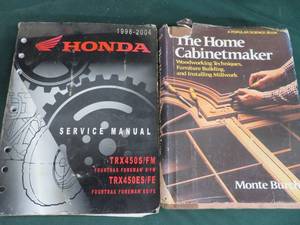lot 103 image: HONDA SERVICE MANUAL & VINTAGE BURCH CABINET BOOK