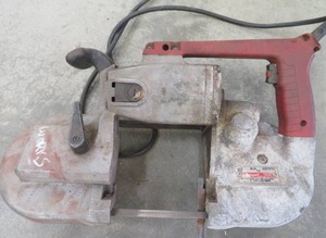 lot 106 image: MILWAUKEE PORTABLE BANDSAW (WORKS)