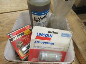 lot 125 image: MISC. NEW AND OLD COUPLERS, & NEW CONTAINERS OF KILLFROST