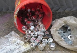 lot 199 image: BUCKET OF NEW NUTS AND WASHERS