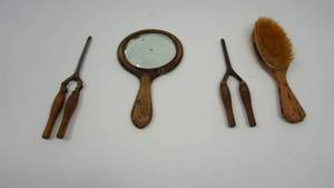 lot 31 image: Antique hand mirror, had hairbrush, two hot hair irons
