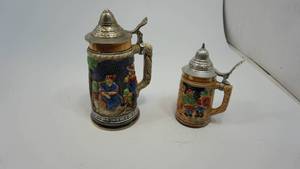 lot 45 image: Set of two vintage beer steins