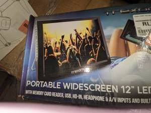 lot 141 image: Trexonic Ultra Lightweight Rechargeable 12 LED TV 