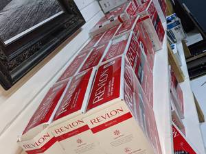lot 98 image: Lot of 25 Revlon Volumizing Hair Drying Brushes