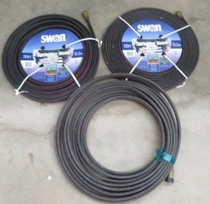 lot 64 image: THREE 50 SWAN SPRINKLER HOSE