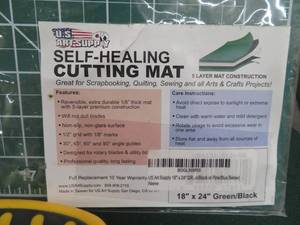 lot 93 image: NEW SELF HEALING CUTTING MAT  FISCARS ACRYLIC RULER