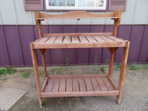 lot 99 image: OUTDOOR POTTING TABLE  SHELF.