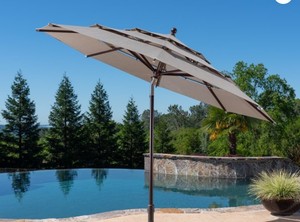 lot 605 image: Pro Shade 11ft Wood-look Aluminum Umbrella with Tilt - Cast Shale