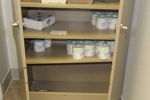 lot 573 image: Contents of Storage Cabinet - Paper Towels, Toilet Paper
