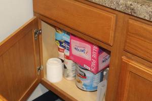 lot 645 image: Lot of  Coffee Supplies - Creamer, Sweet N Low, Equal, Swiss Miss, Misc
