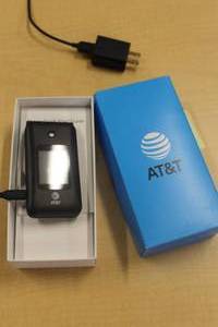 lot 696 image: AT&T Flip Phone (in original packaging)