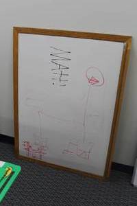 lot 694 image: Wood Framed Dry Erase Board